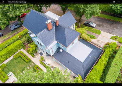 metal roof aerial view on blue house