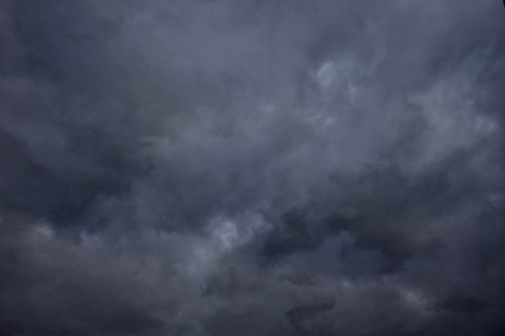 Background Picture of Natural Dark Thunder and Storm Clouds to illustrate how much wind can a metal roof withstand?