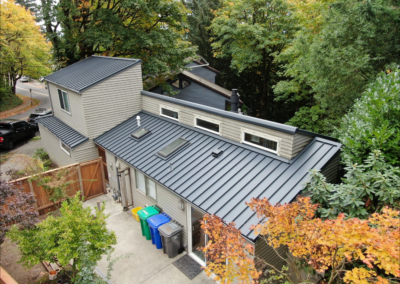 Standing seam metal roof installed on modern style home