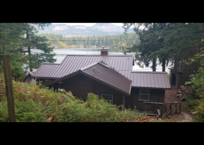 Brown standing seam metal roof on a home in the Columbia River Gorge