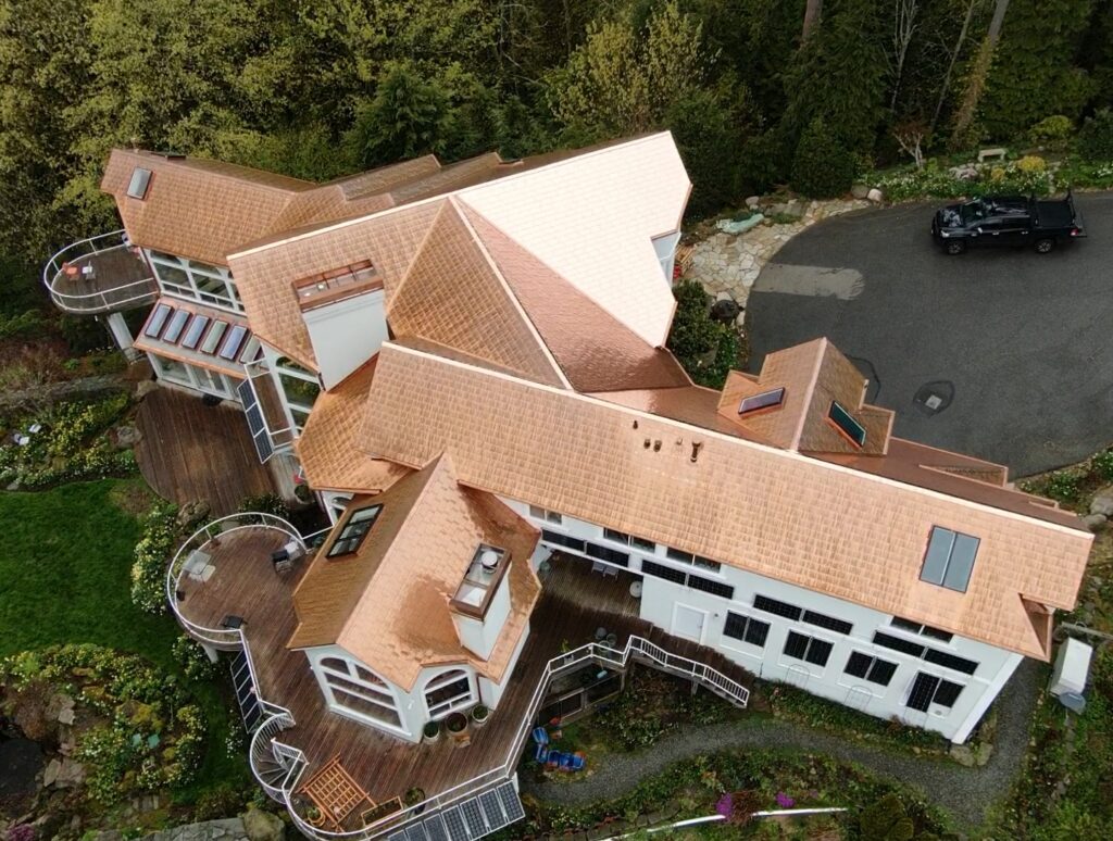 Beautiful copper roof on a luxury home to help illustrate is metal roofing aluminum