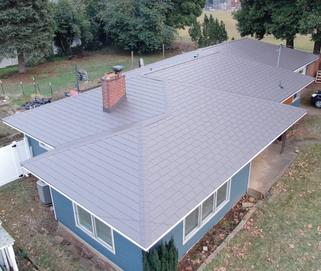 Tudor Brown Woodgrain Embossed Aluminum Shingle - Salem, OR - to help illustrate the best aluminum roof coating.