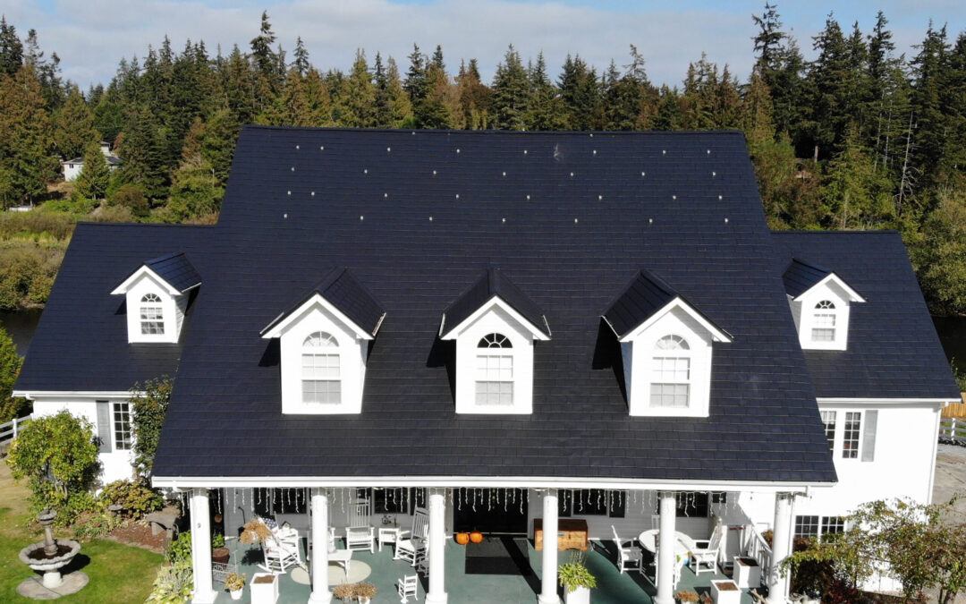 Black Slate Aluminum Shingle omn a home to illustrate types of metal roofs for homes.