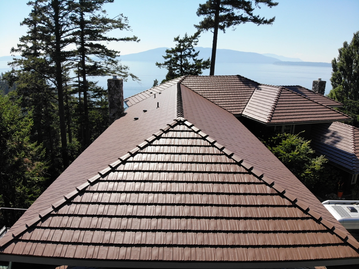 Close up of a brown Permalock shingle roof pitch on a beach home